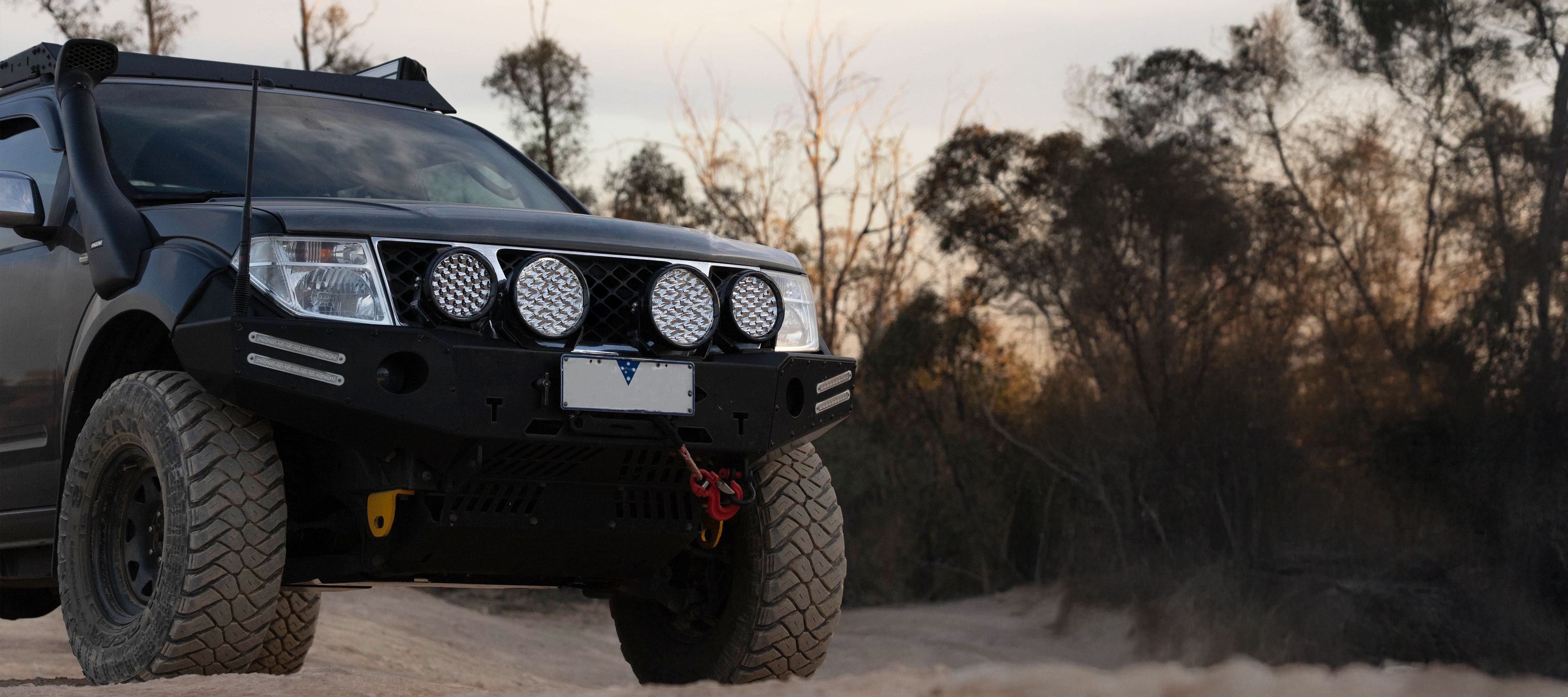 A Nissan Navarra with 4 Sport Plus Driving Lights on a bull bar.